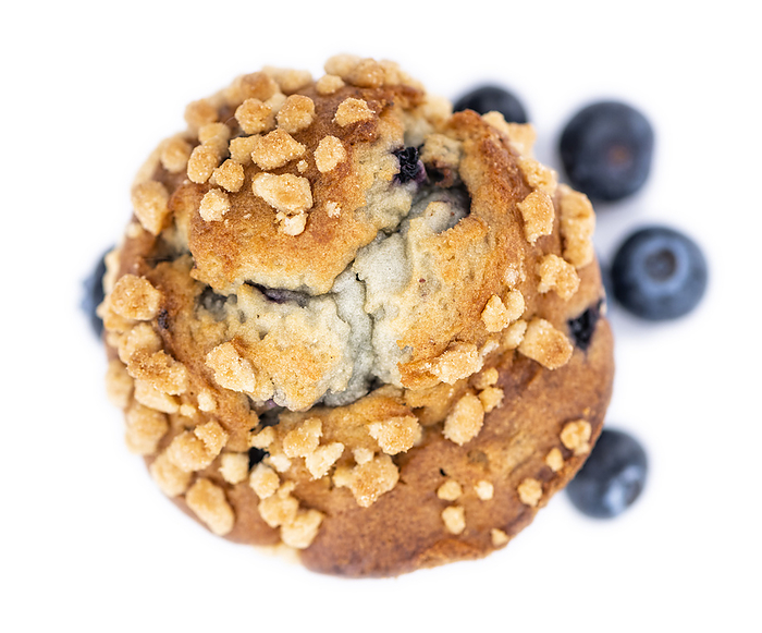 Some Blueberry Muffins isolated on white  selective focus  Some Blueberry Muffins isolated on white  selective focus , by Zoonar Christoph Sch