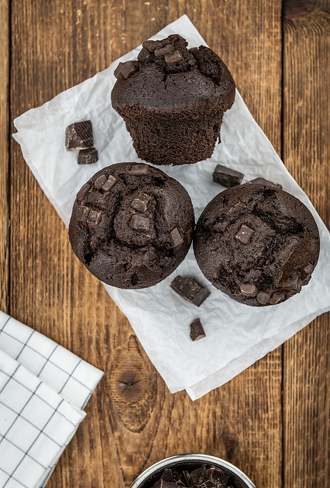 Chocolate Muffins  selective focus  detailed close up shot  Chocolate Muffins  selective focus  detailed close up shot , by Zoonar Christoph Sch