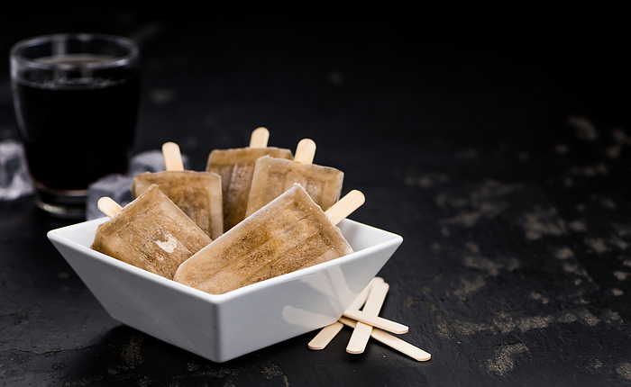 Cola Popsicles  selective focus  Cola Popsicles  selective focus , by Zoonar Christoph Sch