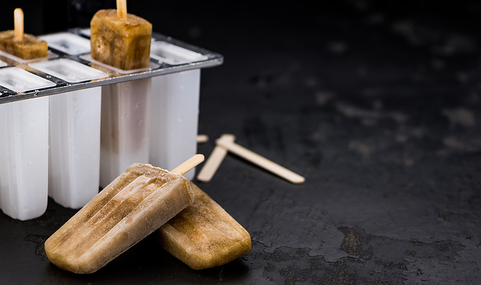 Some homemade Cola Popsicles Some homemade Cola Popsicles, by Zoonar Christoph Sch