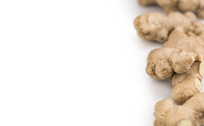 Some Raw Ginger isolated on white  selective focus  Some Raw Ginger isolated on white  selective focus , by Zoonar Christoph Sch