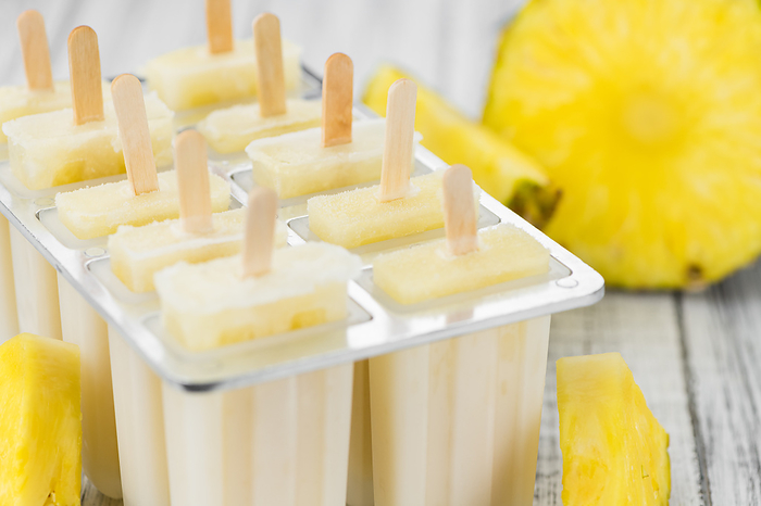 Homemade Pineapple Popsicles  selective focus  Homemade Pineapple Popsicles  selective focus , by Zoonar Christoph Sch