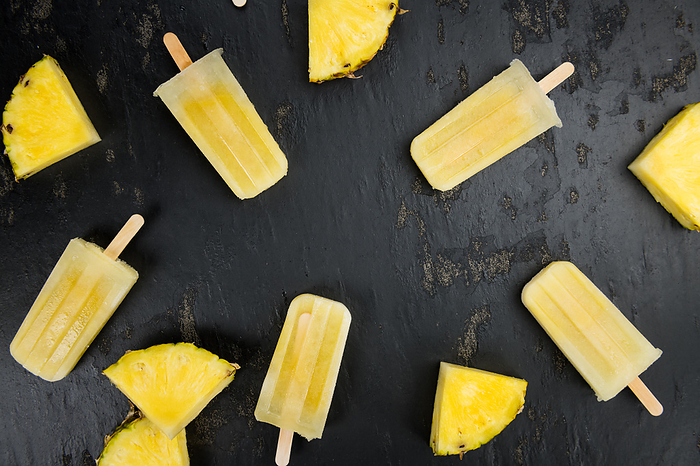 Pineapple Popsicles on a slate slab  selective focus  Pineapple Popsicles on a slate slab  selective focus , by Zoonar Christoph Sch