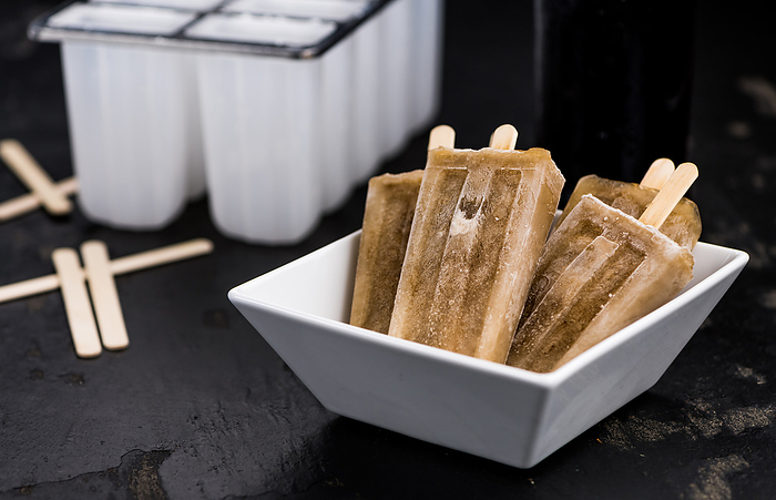 Cola Popsicles  selective focus  Cola Popsicles  selective focus , by Zoonar Christoph Sch