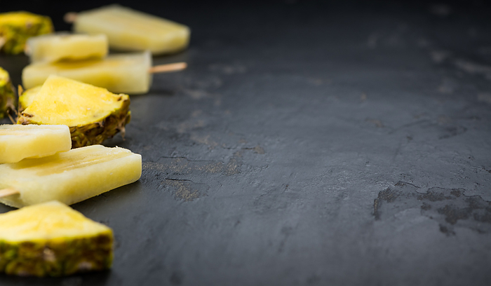 Pineapple Popsicles on a slate slab  selective focus  Pineapple Popsicles on a slate slab  selective focus , by Zoonar Christoph Sch