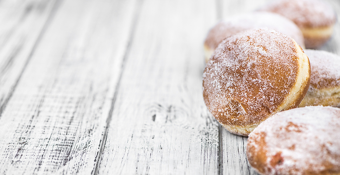 Berliner Doughnuts  fresh made  as detailed close up shot  selective focus Berliner Doughnuts  fresh made  as detailed close up shot  selective focus, by Zoonar Christoph Sch