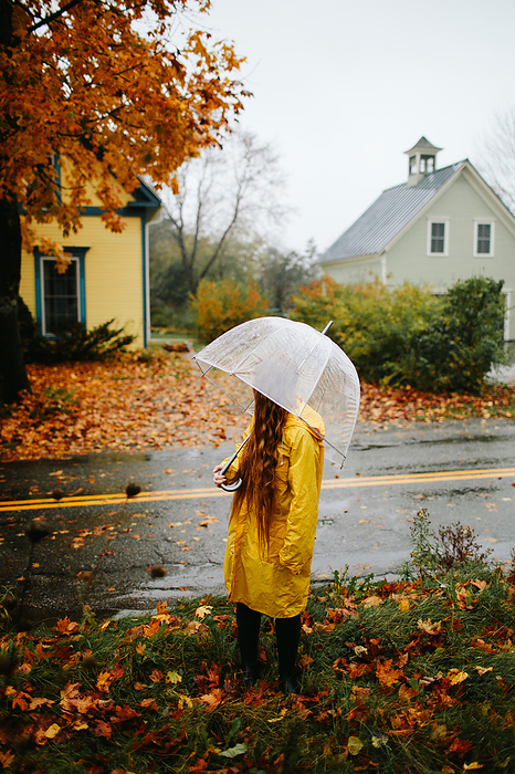 Leslie Swan Photography LLC Woman watched the rainy road in Autumn, by Cavan Images   Leslie Swan
