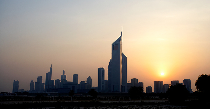 The city of Dubai at sunset, by Cavan Images / dund photography