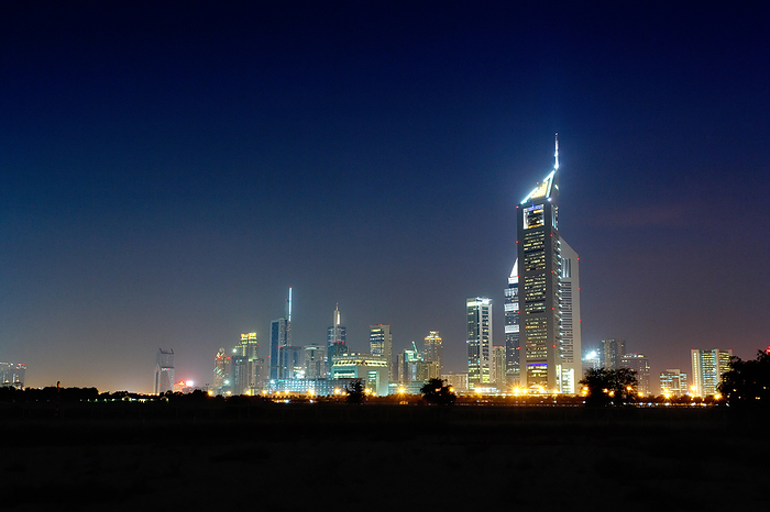 The city of Dubai at night, by Cavan Images / dund photography
