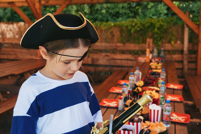 A child in a pirate costume, birthday. A child in a pirate costume, birthday., by Cavan Images   Darya Kisialiova