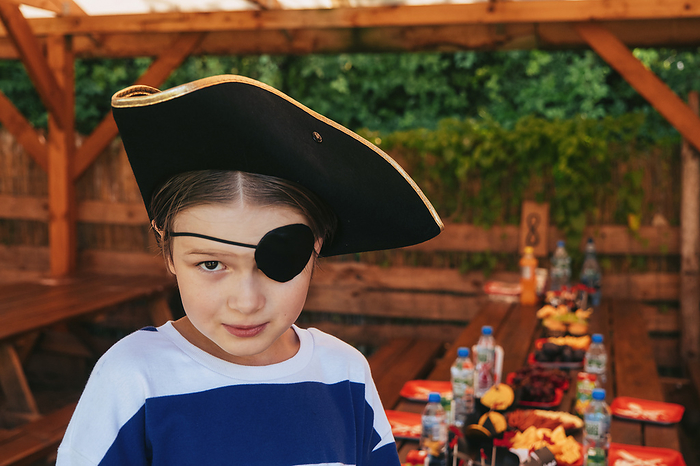 A child in a pirate costume, birthday. A child in a pirate costume, birthday., by Cavan Images   Darya Kisialiova