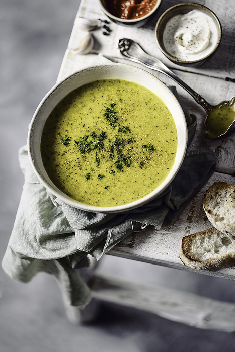Bowl of Soup with Bread and Condiments, by Cavan Images / Sara Ghedina