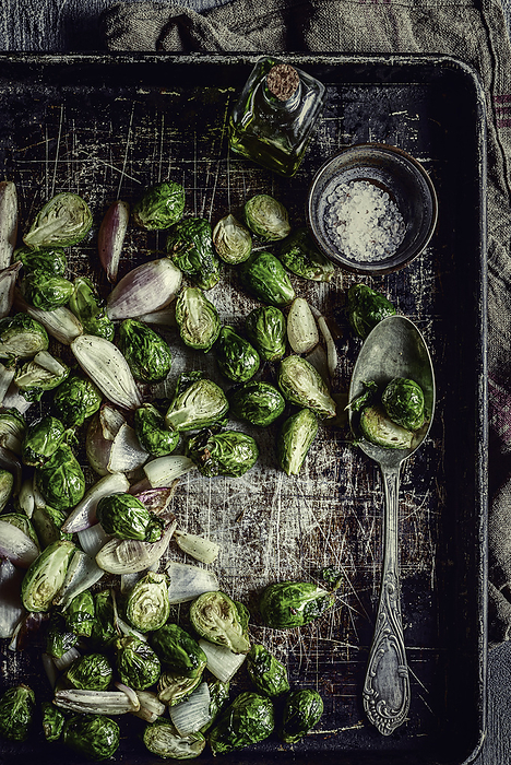 Roasted Brussel Sprouts on Baking Dish, by Cavan Images / Sara Ghedina