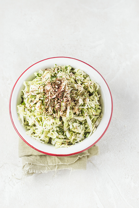 Bowl of Coleslaw with Spices, by Cavan Images / Sara Ghedina