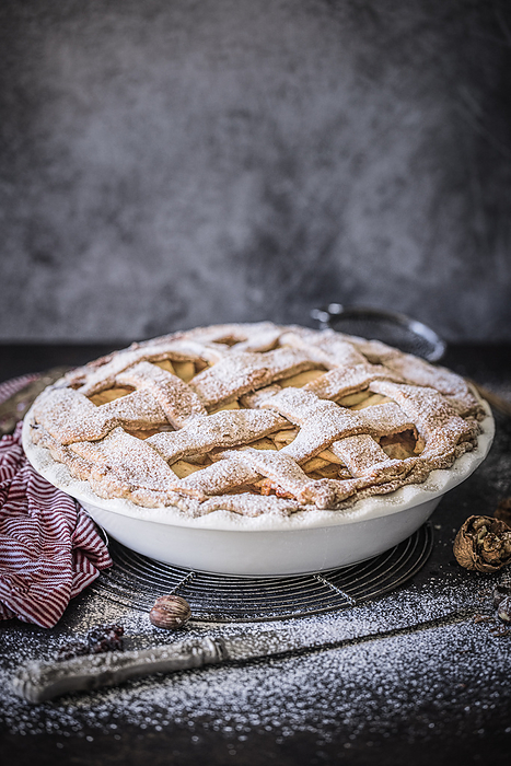 Whole Apple Pie in Baking Dish, by Cavan Images / Sara Ghedina