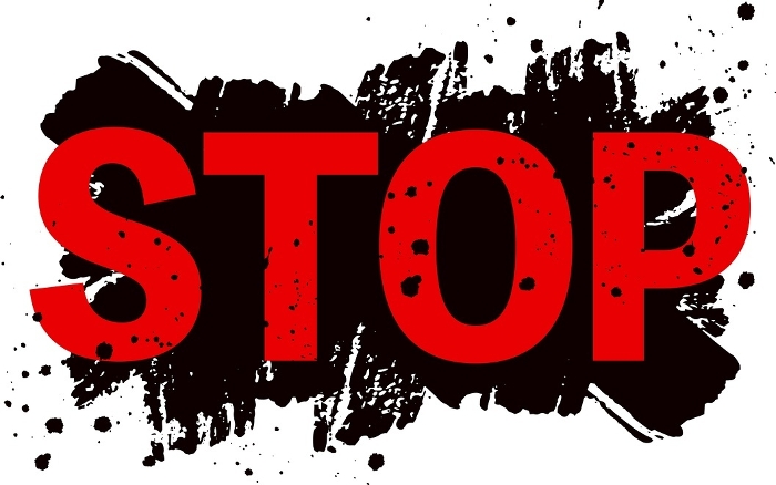 STOP letters and brush background