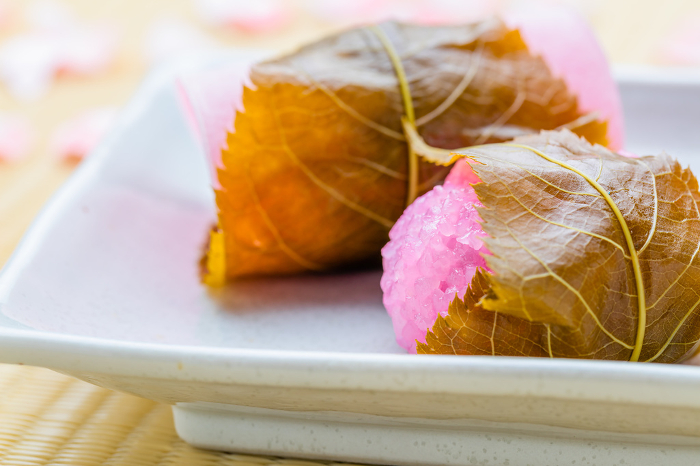 rice cake with bean paste wrapped in a preserved cherry leaf