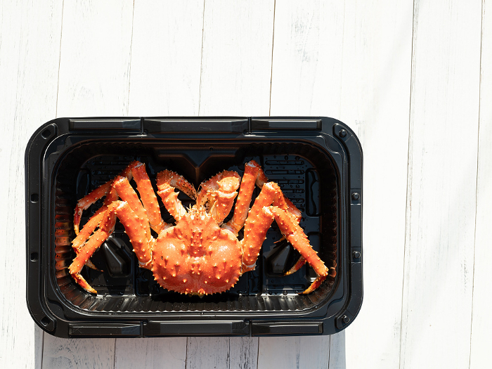 King crab in a delivery container