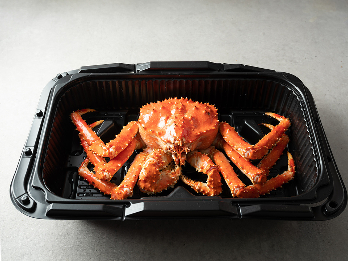 King crab in a delivery container