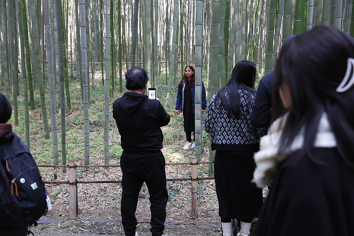 Crowded with tourists in Kyoto Foreign tourists take picture of Bamboo Forest in Arashiyama, Kyoto Prefecture, Japan, March 22, 2024.  Photo by Yohei Osada AFLO 