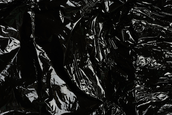 Crumpled black polyethylene, full frame Crumpled black polyethylene, full frame