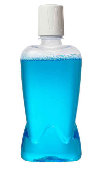 Transparent plastic bottle with bubbles and blue liquid on isolated background. Antiseptic mouth rinse Transparent plastic bottle with bubbles and blue liquid on isolated background. Antiseptic mouth rinse
