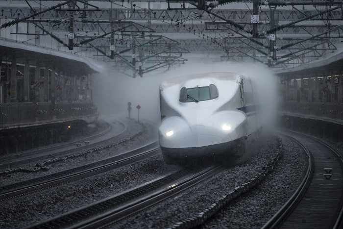 Shinkansen N700A running with rain splashes