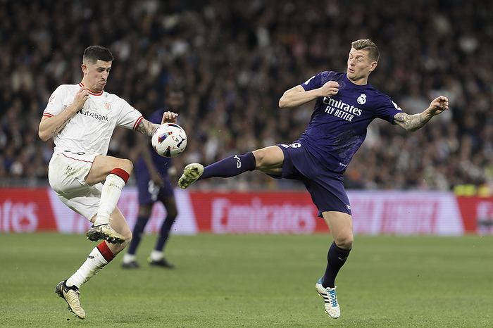 LA LIGA EA Sports   Real Madrid vs Athletic Club   MADRID, SPAIN   MARCH 31: Toni Kroos of Real Madrid  and Oihan Sancet of Athletic Club de Bilbao fight for the ball  during the La liga 2023 24 match between Real Madrid and Athletic Club at Santiago Bernabeu Stadium.  Photo by Guille Martinez AFLO 