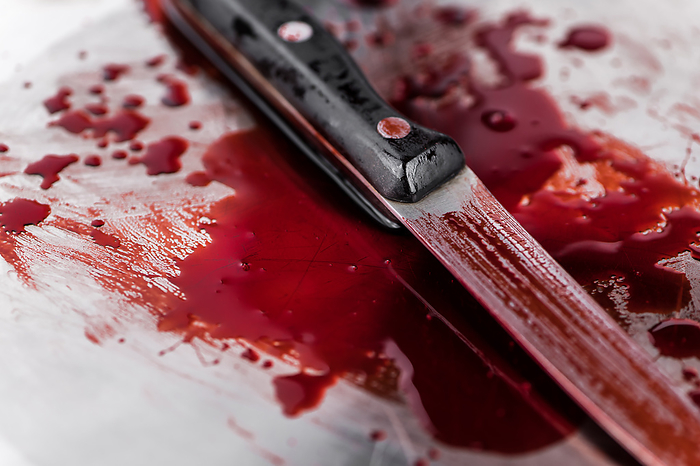Bloody Knive detailed close up shot Bloody Knive detailed close up shot, by Zoonar Christoph Sch