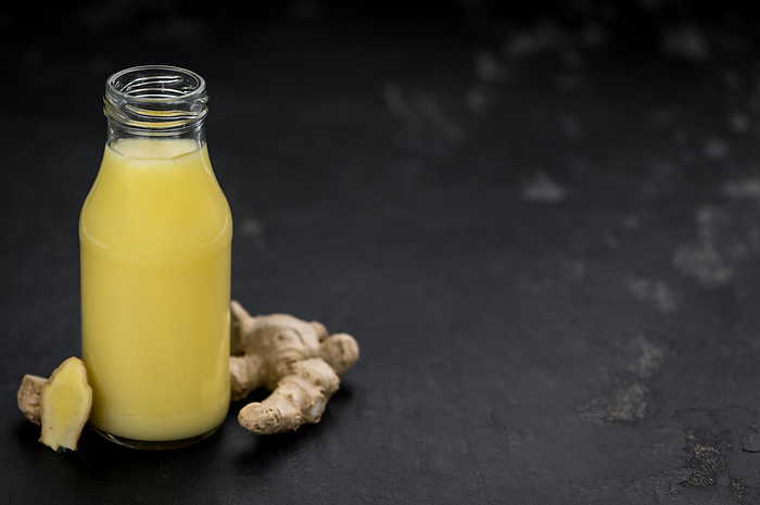 Portion of Ginger Juice as detailed close up shot  selective focus Portion of Ginger Juice as detailed close up shot  selective focus, by Zoonar Christoph Sch
