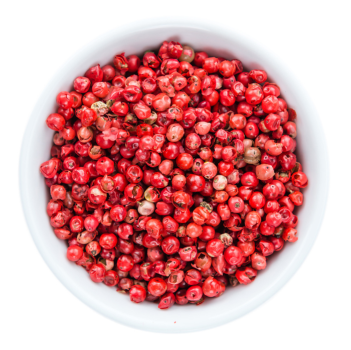 Pink Peppercorns isolated on white background Pink Peppercorns isolated on white background, by Zoonar Christoph Sch