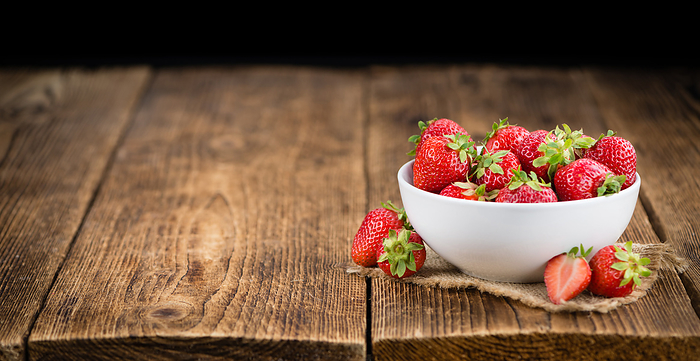 Strawberries on wooden background  selective focus Strawberries on wooden background  selective focus, by Zoonar Christoph Sch