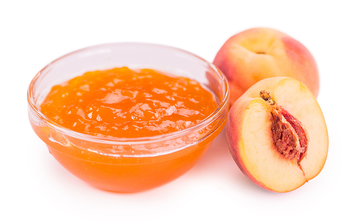 Portion of Peach Jam on a slate slab Portion of Peach Jam on a slate slab, by Zoonar Christoph Sch