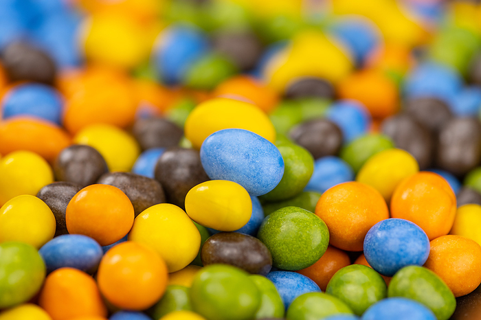 Chocolate coated peanuts  close up  selective focus  Chocolate coated peanuts  close up  selective focus , by Zoonar Christoph Sch