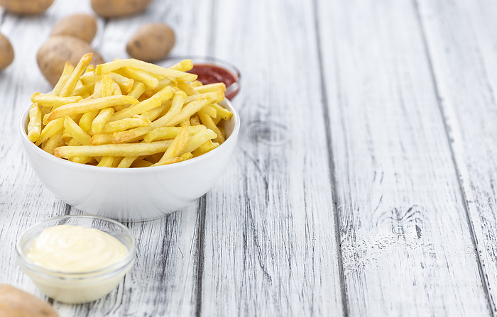 Crispy French Fries  selective focus  close up shot  Crispy French Fries  selective focus  close up shot , by Zoonar Christoph Sch
