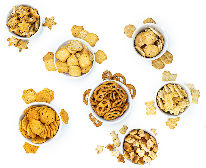 Portion of mixed Snacks isolated on white  close up shot  selective focus  Portion of mixed Snacks isolated on white  close up shot  selective focus , by Zoonar Christoph Sch