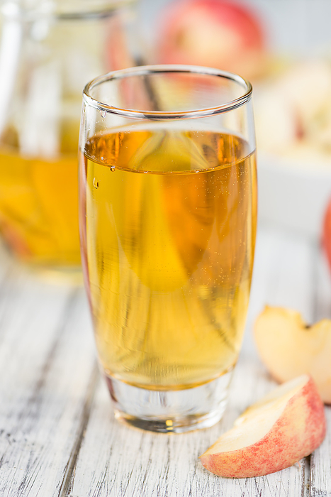 Apple Cider on wooden background  selective focus  Apple Cider on wooden background  selective focus , by Zoonar Christoph Sch