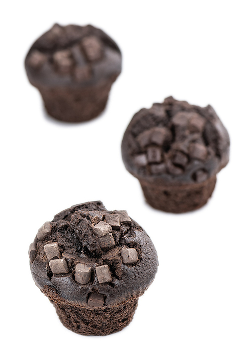 Some Chocolate Muffins isolated on white  selective focus  Some Chocolate Muffins isolated on white  selective focus , by Zoonar Christoph Sch