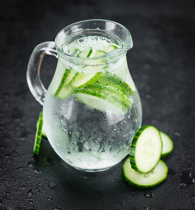 Cucumber Water on a vintage slate slab, selective focus Cucumber Water on a vintage slate slab, selective focus, by Zoonar Christoph Sch