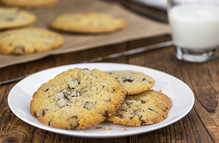 Chocolate Chip Cookies  fresh made  as detailed close up shot  selective focus Chocolate Chip Cookies  fresh made  as detailed close up shot  selective focus, by Zoonar Christoph Sch