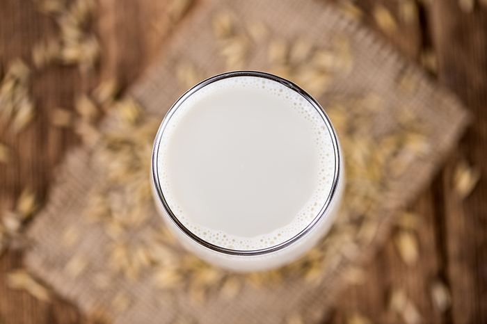 Portion of fresh Oat Milk  selective focus  close up shot  Portion of fresh Oat Milk  selective focus  close up shot , by Zoonar Christoph Sch