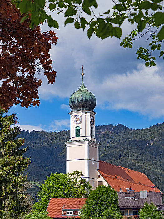 View of the tower of the Catholic parish church of St. Peter and Paul in Oberammergau, Bavaria, Germ View of the tower of the Catholic parish church of St. Peter and Paul in Oberammergau, Bavaria, Germ, by Zoonar Katrin May