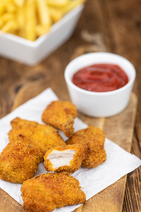 Chicken Nuggets  close up shot  selective focus  Chicken Nuggets  close up shot  selective focus , by Zoonar Christoph Sch