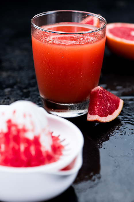 Freshly squeezed Grapefruit Juice  selective focus  Freshly squeezed Grapefruit Juice  selective focus , by Zoonar Christoph Sch