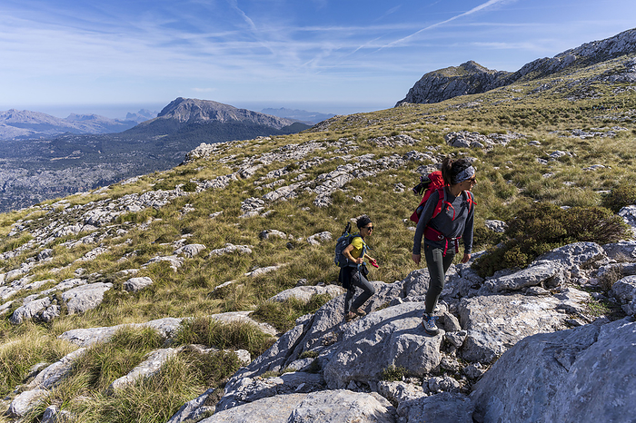 two hikers in the tramuntana mountains two hikers in the tramuntana mountains, by Zoonar Tolo