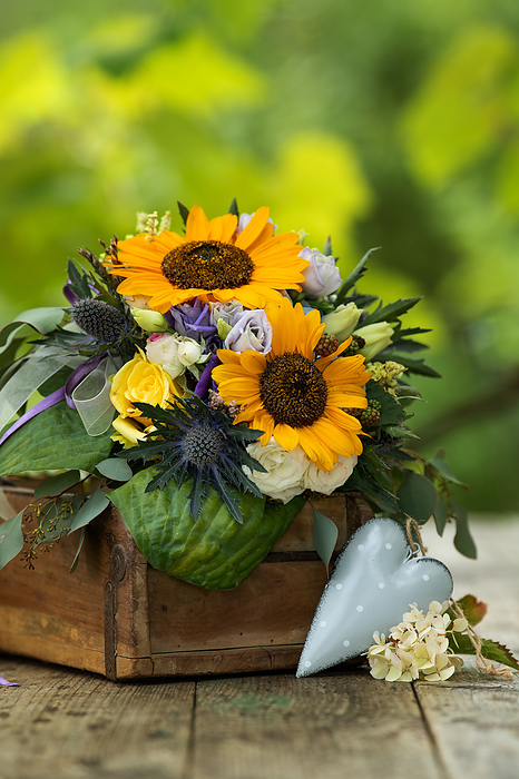 Colorful autumn flower bouquet with sun flowers Colorful autumn flower bouquet with sun flowers, by Zoonar Judith Kiener