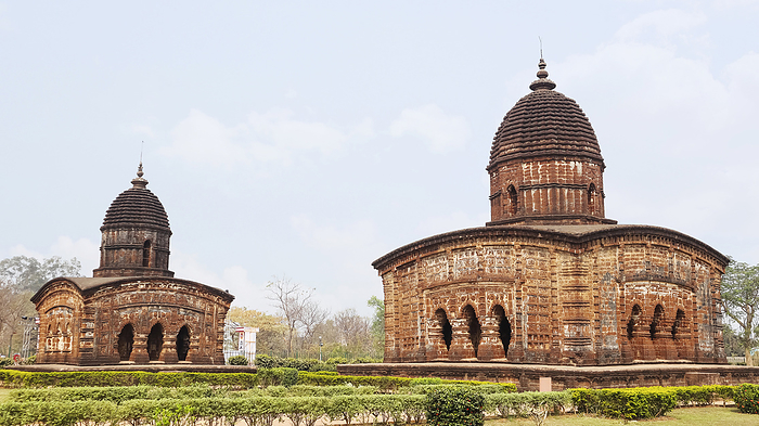 View of one of the Jor mandir Group of Temples  a cluster of three historic temples, Red Bricks Carving Temple, Bishnupur, West Bengal, India. View of one of the Jor mandir Group of Temples  a cluster of three historic temples, Red Bricks Carving Temple, Bishnupur, West Bengal, India., by Zoonar RealityImages