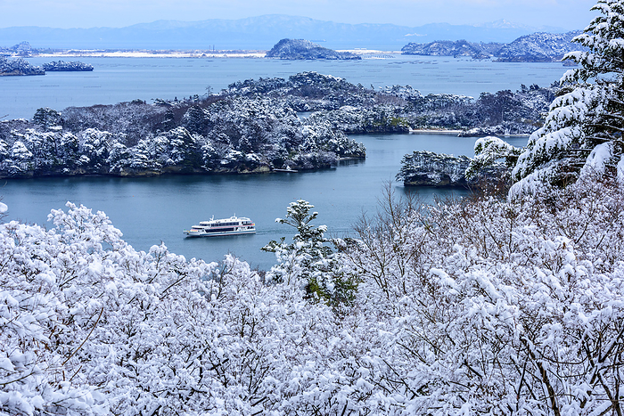 Miyagi Prefecture, Japan: Sightseeing Boat and Matsushima in the Snow at Saigyoshi-no-Matsushima Pine Park