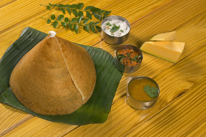 Ghee Roast Dosa Recipe is a classic South Indian Breakfast Tiffin that is made with fresh homemade idli dosa batter Ghee Roast Dosa Recipe is a classic South Indian Breakfast Tiffin that is made with fresh homemade idli dosa batter, by Zoonar RealityImages
