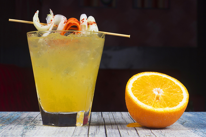 Orange Mint Mocktail at a bar counter Orange Mint Mocktail at a bar counter, by Zoonar RealityImages